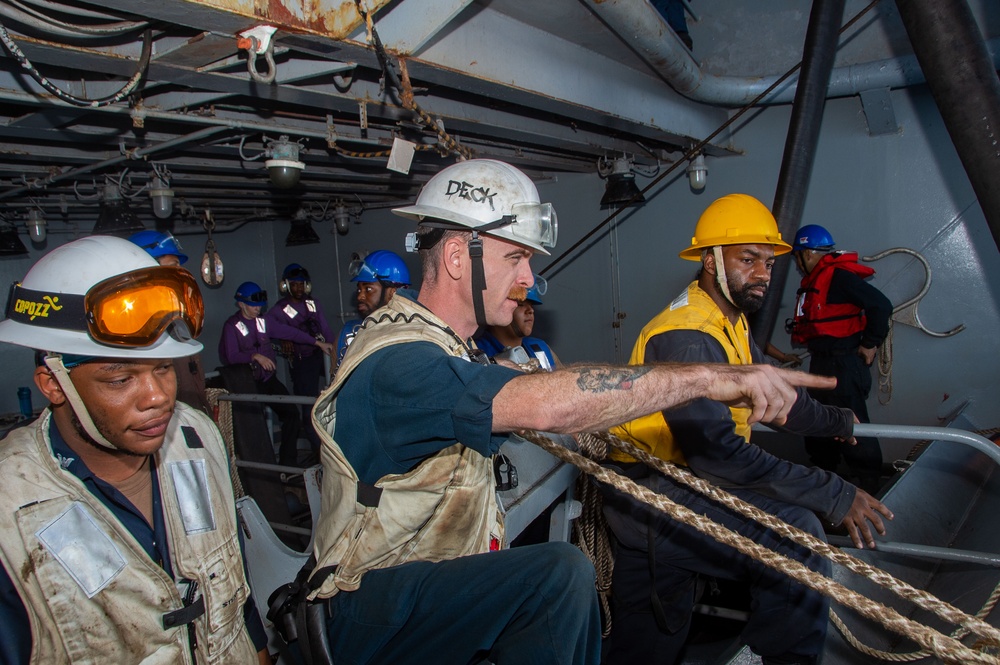 USS Ronald Reagan (CVN 76) conducts fueling-at-sea with USS Curtis Wilbur (DDG 54)