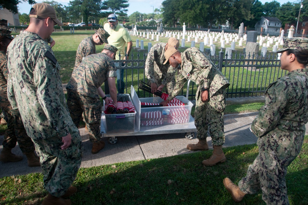 Naval Medical Center Portsmouth Staff Place Independence Day Flags at Naval Cemetery