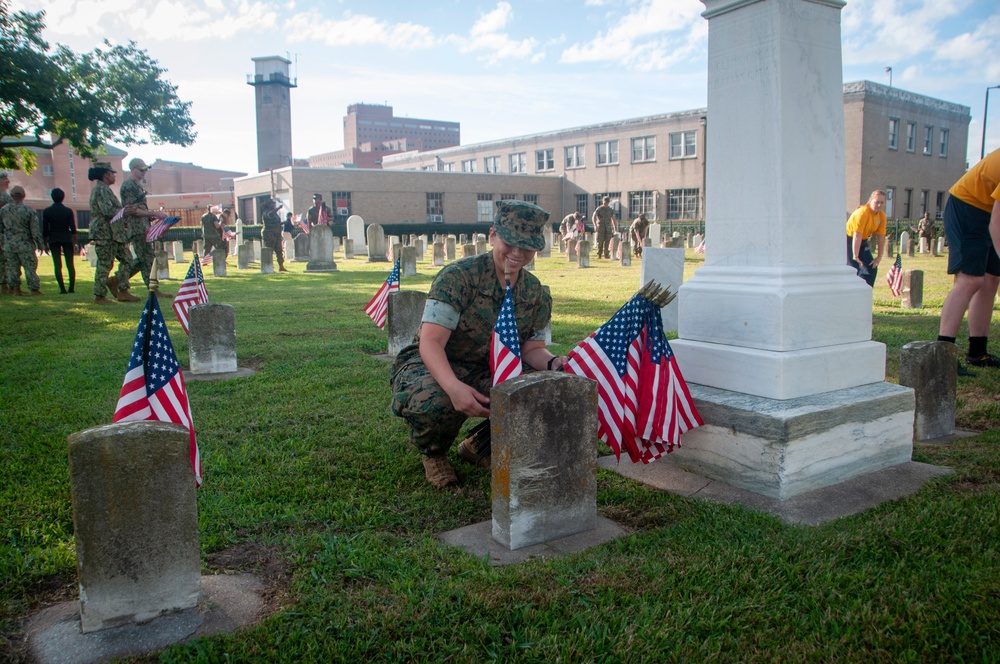 Naval Medical Center Portsmouth Staff Place Independence Day Flags at Naval Cemetery