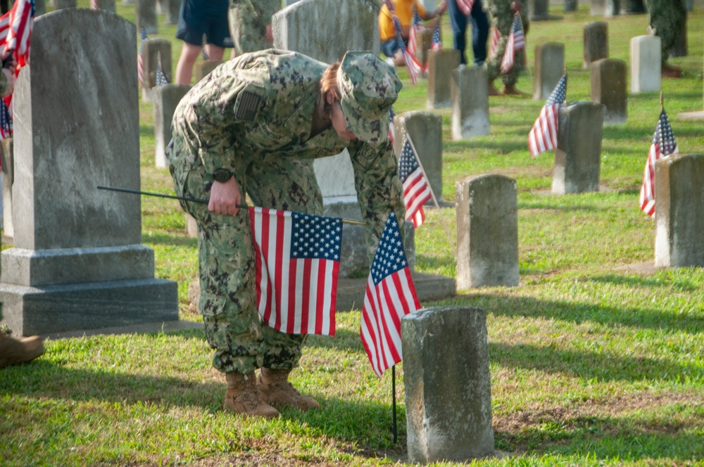 Naval Medical Center Portsmouth Staff Place Independence Day Flags at Naval Cemetery