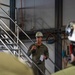 Capt. J. Patrick Thompson, commanding officer of the Nimitz-class aircraft carrier USS John C. Stennis (CVN 74), speaks to the crew during an all hands call