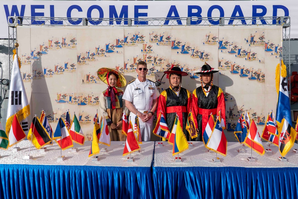 Rear Adm. Michael Wosje Poses for a Group Photo with Republic of Korea Navy sailors During RIMPAC 2024