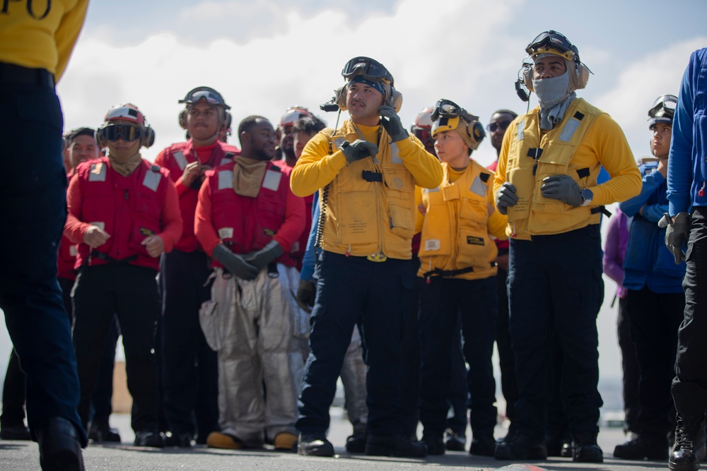 USS Tripoli Sailors execute fire deck firefighting drill