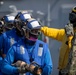 USS Tripoli Sailors execute fire deck firefighting drill