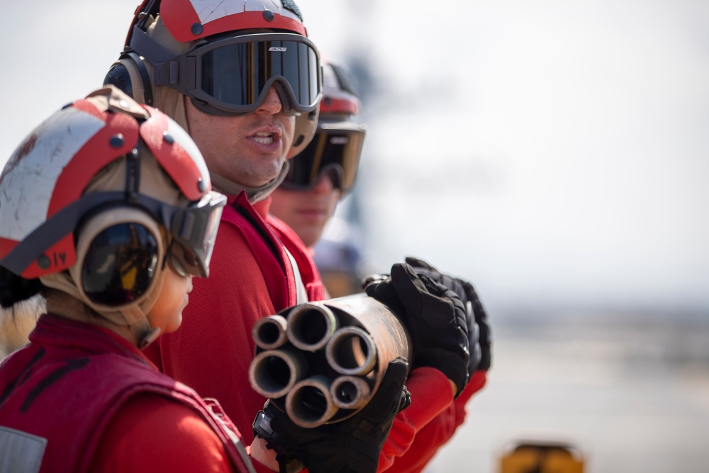USS Tripoli Sailors execute fire deck firefighting drill