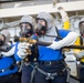 USS Tripoli Sailors execute fire deck firefighting drill