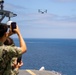 Tripoli Hosts Flyby For Midshipmen