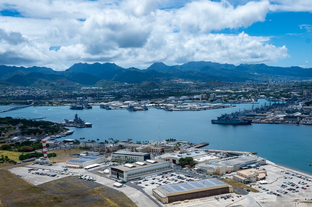 Aerial view of ships moored at Pearl Harbor and Ford Island during RIMPAC 2024