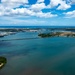 Aerial view of ships moored at Pearl Harbor and Ford Island during RIMPAC 2024