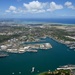 Aerial view of ships moored at Pearl Harbor and Ford Island during RIMPAC 2024