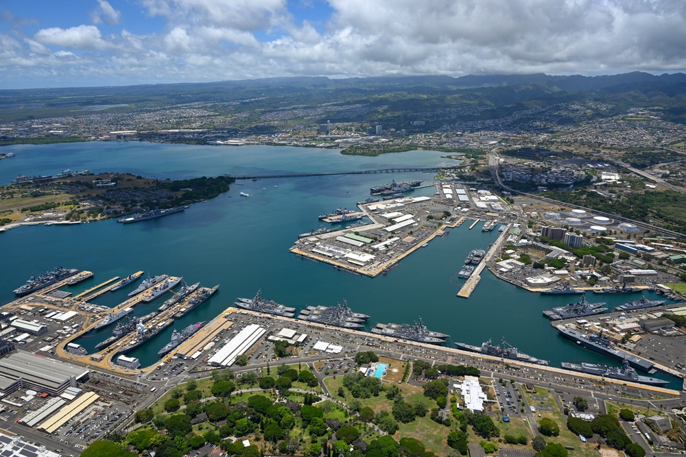 Aerial view of ships moored at Pearl Harbor and Ford Island during RIMPAC 2024