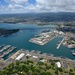 Aerial view of ships moored at Pearl Harbor and Ford Island during RIMPAC 2024