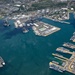 Aerial view of ships moored at Pearl Harbor and Ford Island during RIMPAC 2024