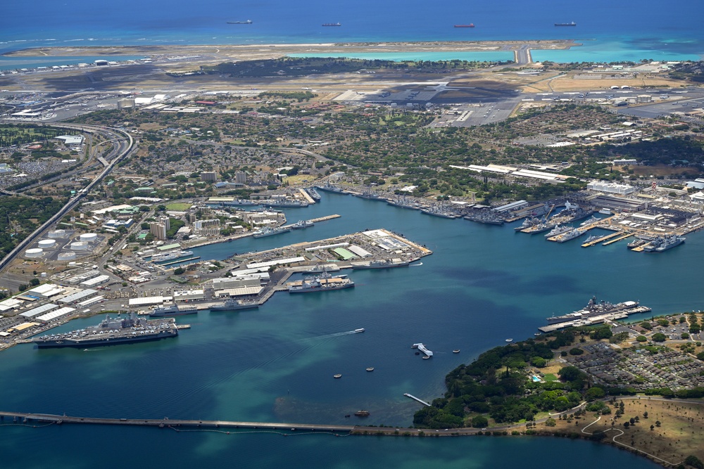 Aerial view of ships moored at Pearl Harbor and Ford Island during RIMPAC 2024