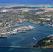 Aerial view of ships moored at Pearl Harbor and Ford Island during RIMPAC 2024