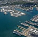 Aerial view of ships moored at Pearl Harbor and Ford Island during RIMPAC 2024