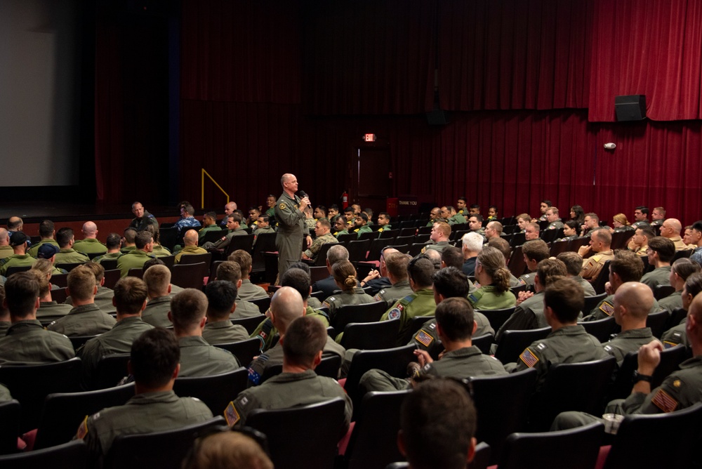 CTF-172 Commander speaks at mass air briefing during RIMPAC 2024