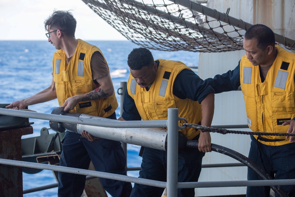 USS Ronald Reagan (CVN 76) Sailors stream Nixie while underway