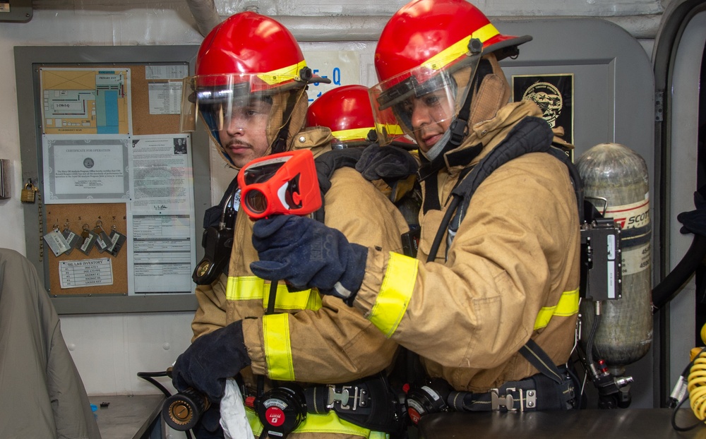 USS Ronald Reagan (CVN 76) Sailors conduct casualty response training during general quarters