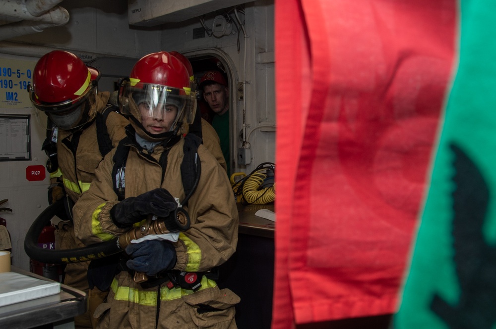 USS Ronald Reagan (CVN 76) Sailors conduct casualty response training during general quarters