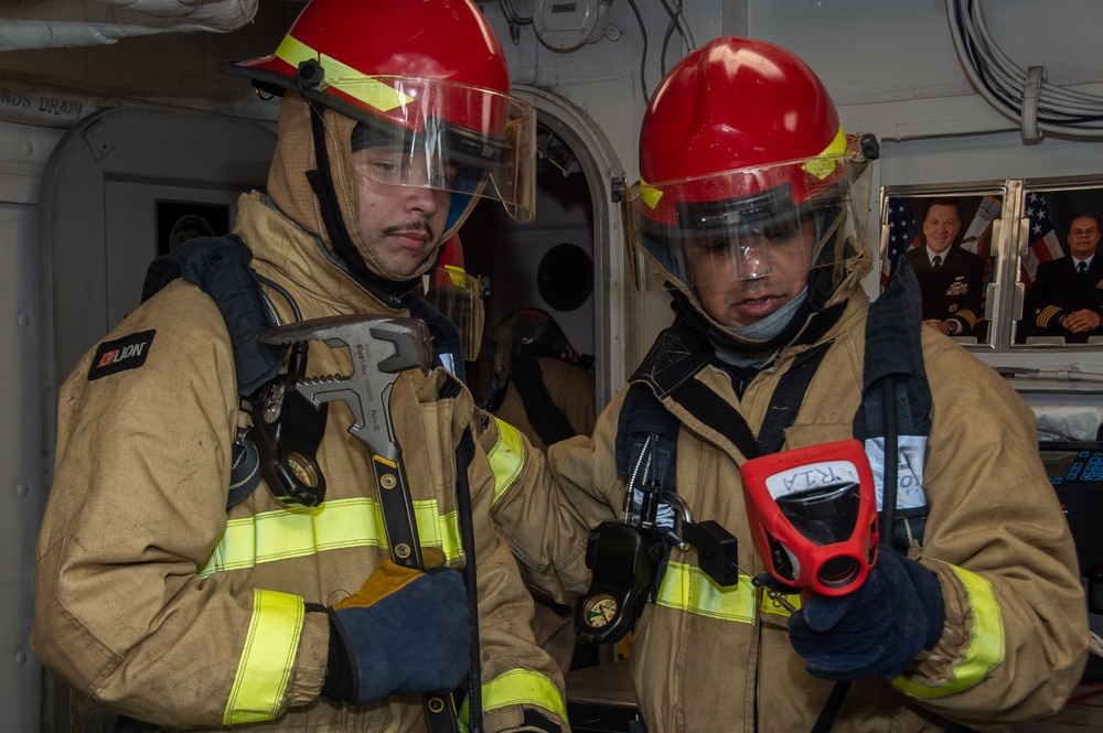 USS Ronald Reagan (CVN 76) Sailors conduct casualty response training during general quarters