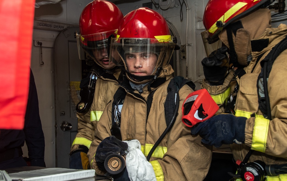 USS Ronald Reagan (CVN 76) Sailors conduct casualty response training during general quarters