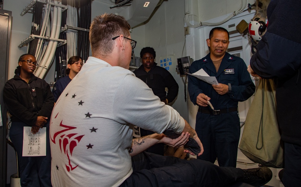 USS Ronald Reagan (CVN76) Sailors participate in Tactical Combat Casualty Care training