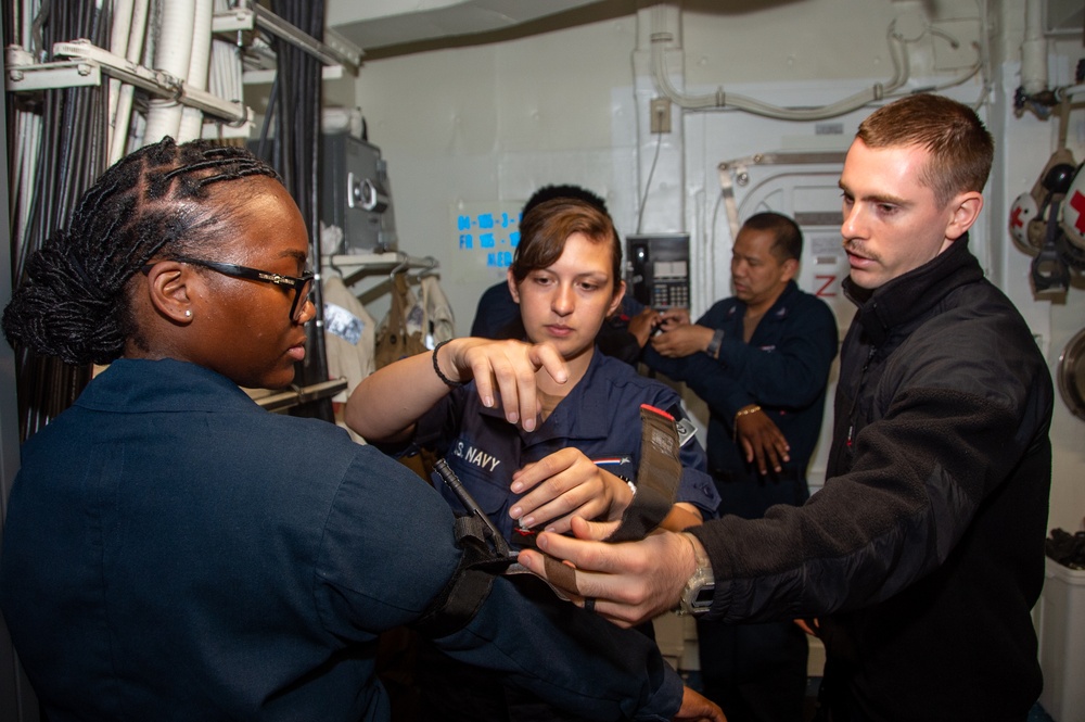 USS Ronald Reagan (CVN76) Sailors participate in Tactical Combat Casualty Care training