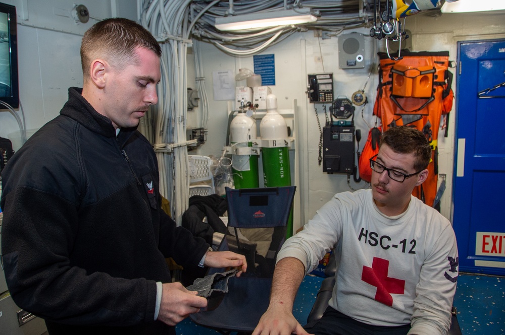 USS Ronald Reagan (CVN76) Sailors participate in Tactical Combat Casualty Care training