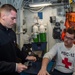 USS Ronald Reagan (CVN76) Sailors participate in Tactical Combat Casualty Care training