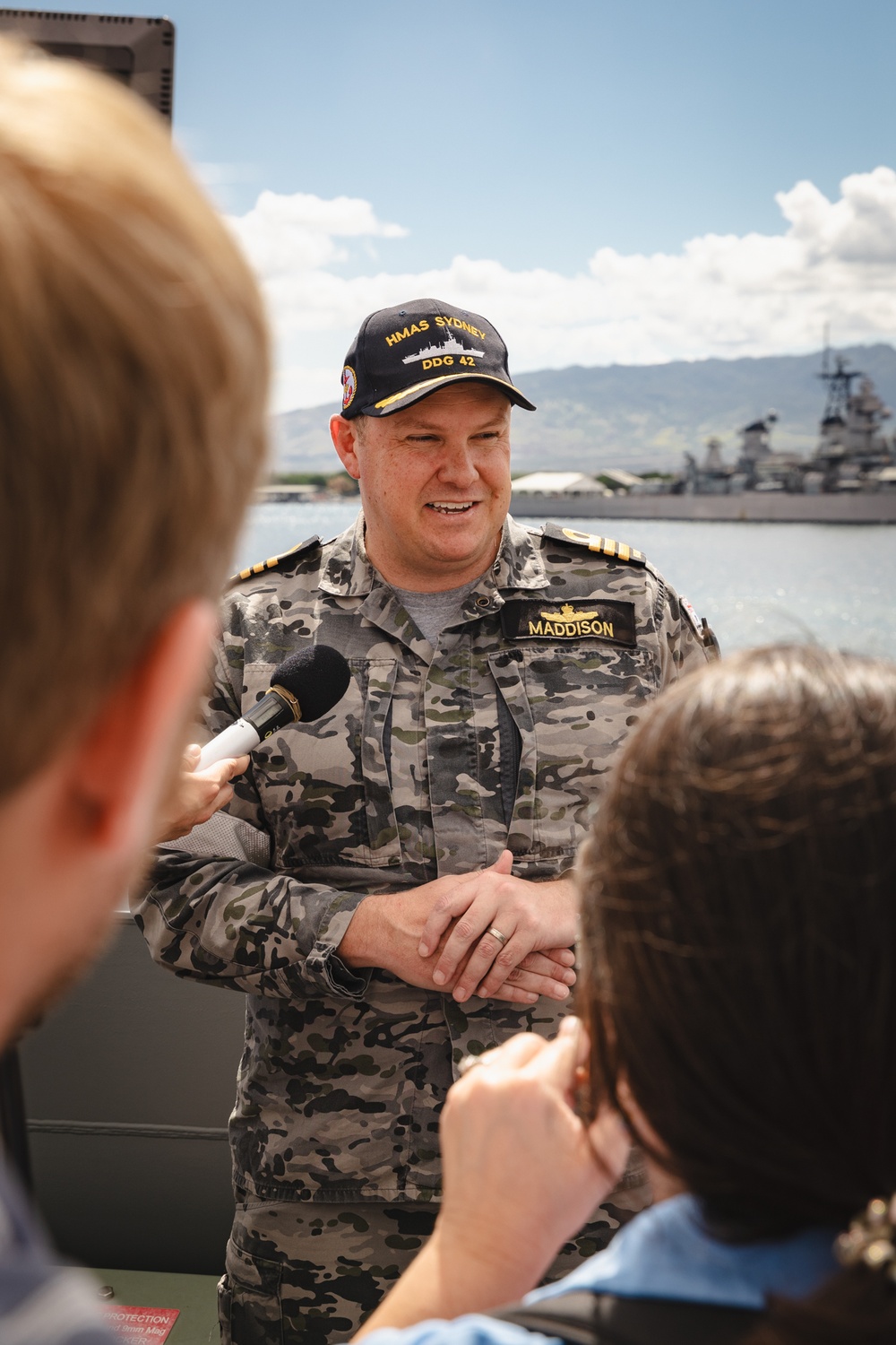 Media conduct interviews with CO of HMAS Sydney, COMD Billy Maddison