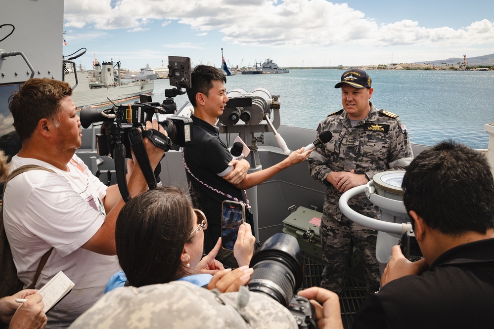 CO of HMAS Sydney, COMD Billy Maddison conducts media engagement