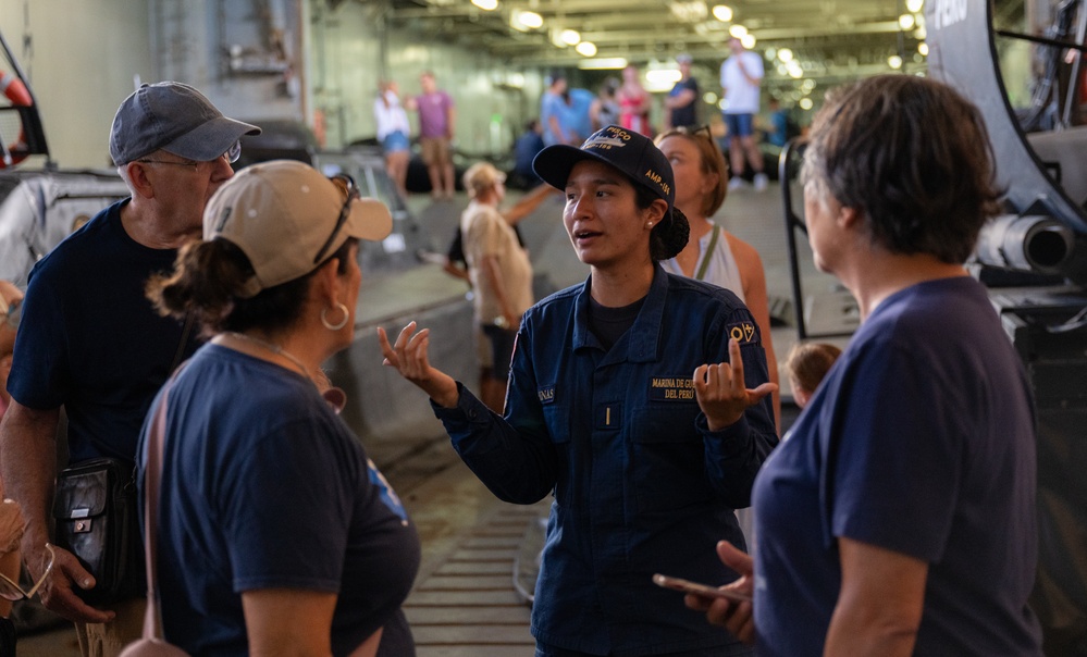 Peruvian Naval Officer welcomes visitors aboard BAP Pisco at RIMPAC 2024