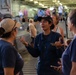 Peruvian Naval Officer welcomes visitors aboard BAP Pisco at RIMPAC 2024