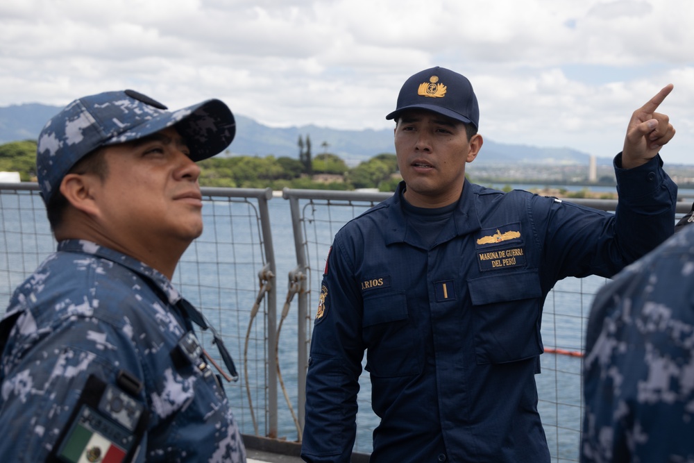 Peruvian Naval Officer welcomes visitors aboard BAP Pisco at RIMPAC 2024