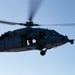 Sailors from HSC-12 conduct a hoisting exercise aboard USS Ronald Reagan (CVN 76)