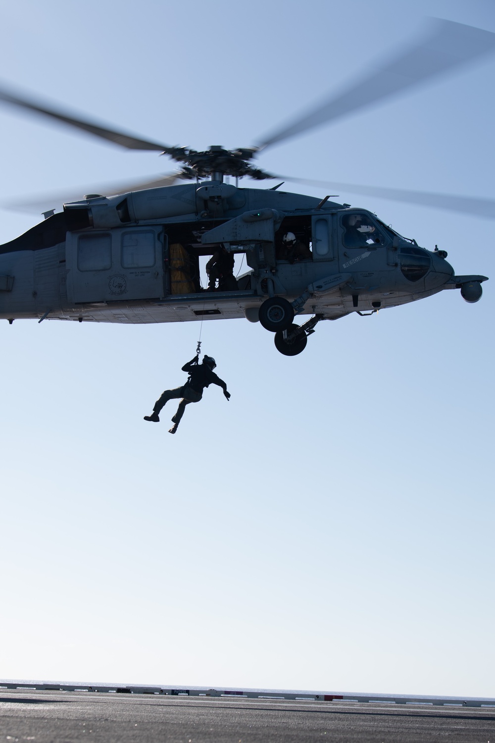 Sailors from HSC-12 conduct a hoisting exercise aboard USS Ronald Reagan (CVN 76)