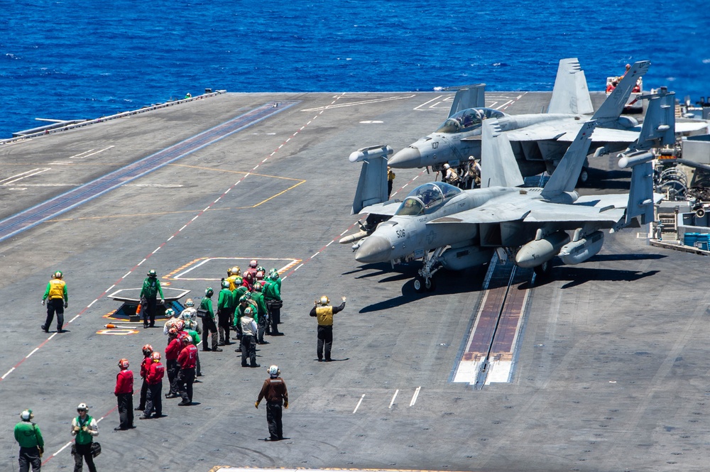 USS Ronald Reagan (CVN76) Sailors conduct flight deck operations