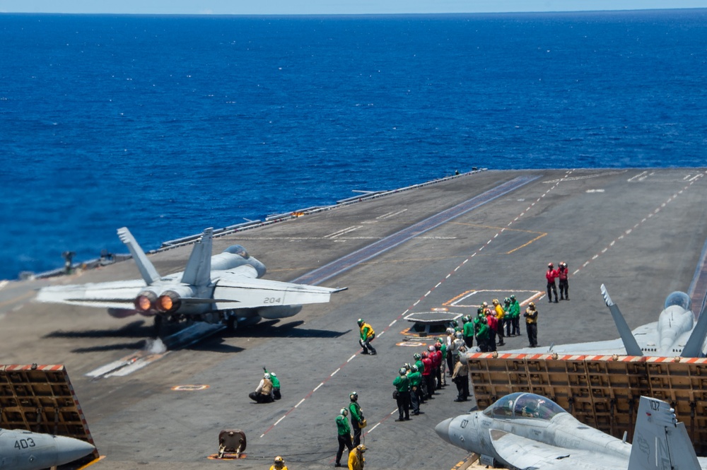 USS Ronald Reagan (CVN76) Sailors conduct flight deck operations