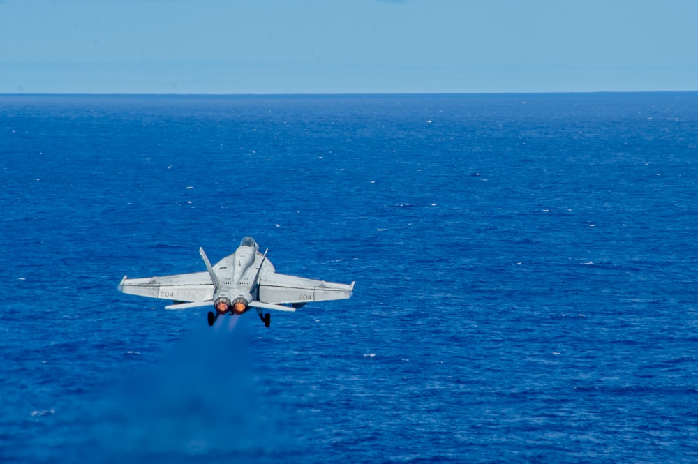 USS Ronald Reagan (CVN76) Sailors conduct flight deck operations