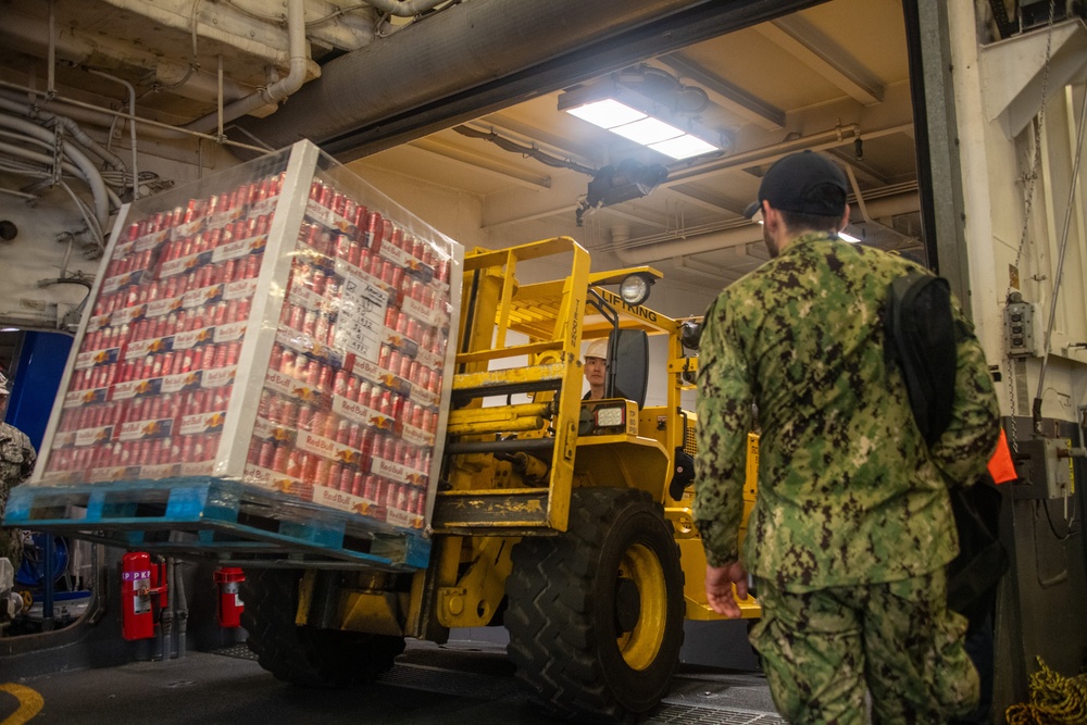 USS America (LHA 6) conducts supply onload.