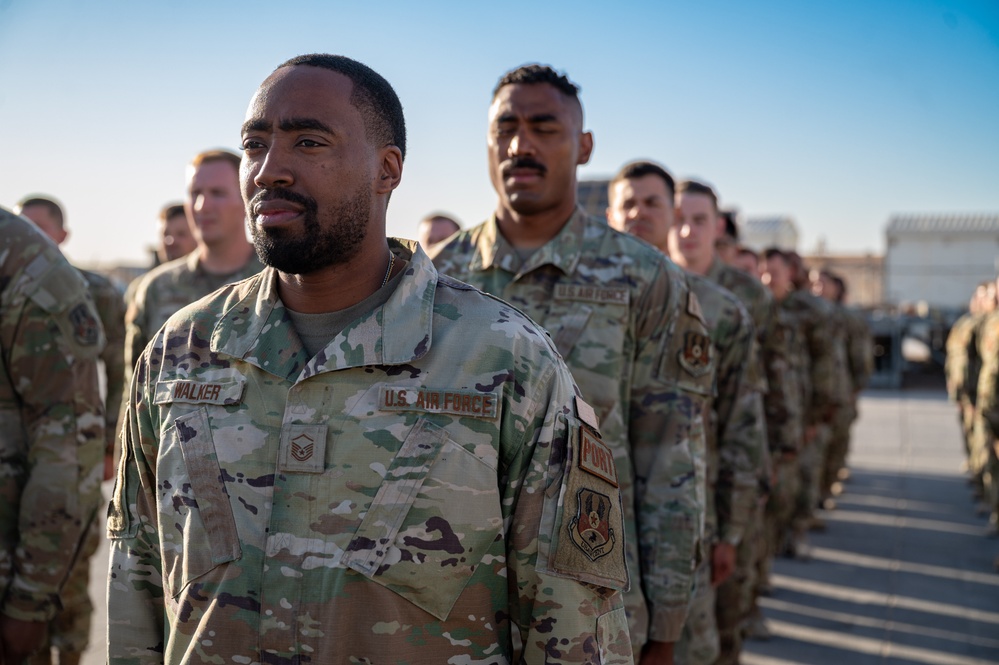 332d Expeditionary Logistics Readiness Squadron conduct an open ranks inspection while deployed