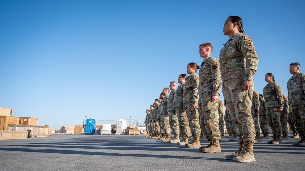 332d Expeditionary Logistics Readiness Squadron conduct an open ranks inspection while deployed