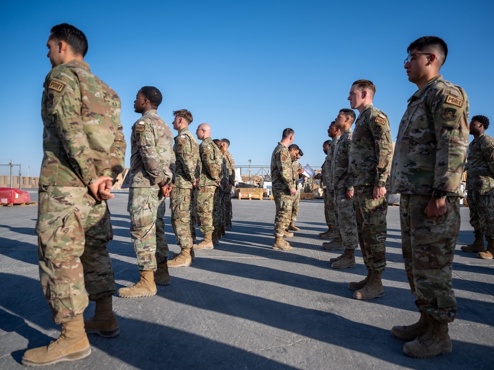 332d Expeditionary Logistics Readiness Squadron conduct an open ranks inspection while deployed