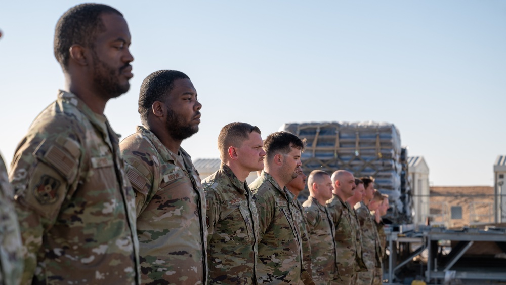 332d Expeditionary Logistics Readiness Squadron conduct an open ranks inspection while deployed