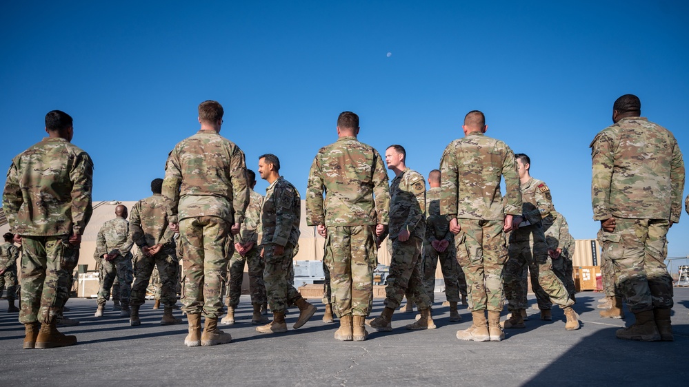 332d Expeditionary Logistics Readiness Squadron conduct an open ranks inspection while deployed