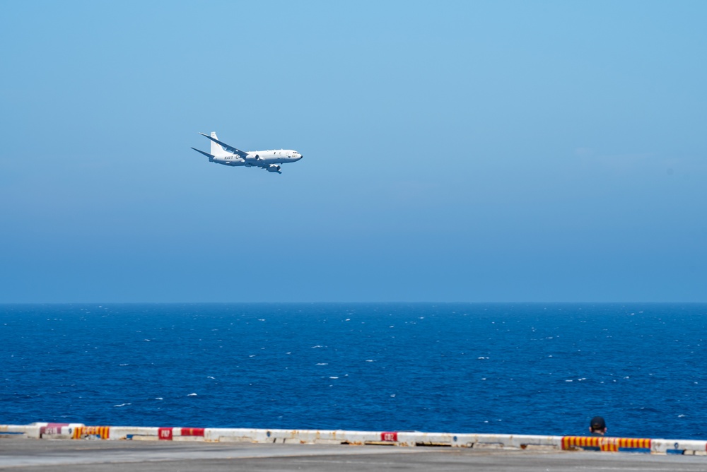 P-8A Flies By Carrier