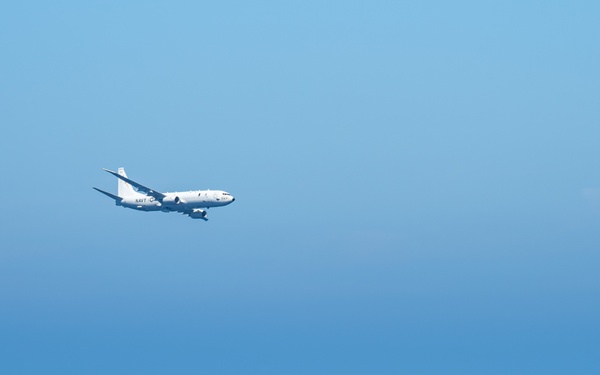 P-8A Flies By Carrier