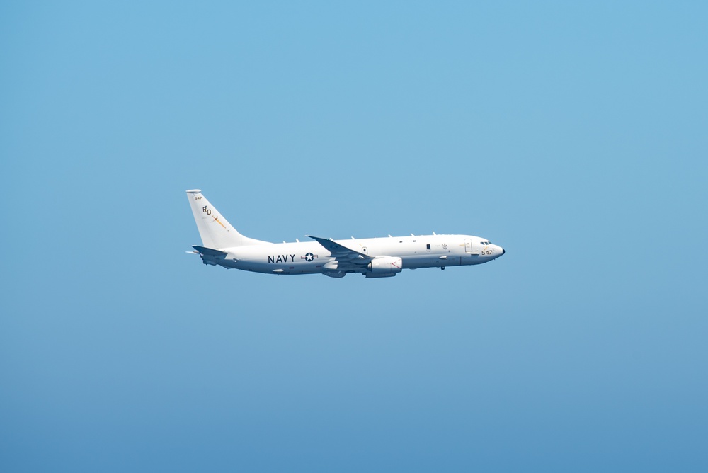 P-8A Flies By Carrier