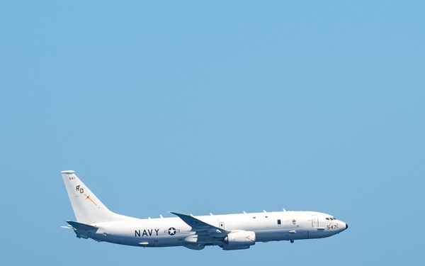 P-8A Flies By Carrier